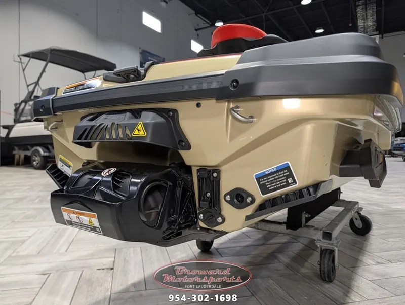 Slide: The Image of Rear view of a 2025 Sea-Doo RXT-X 325 jet ski in a showroom. - 11