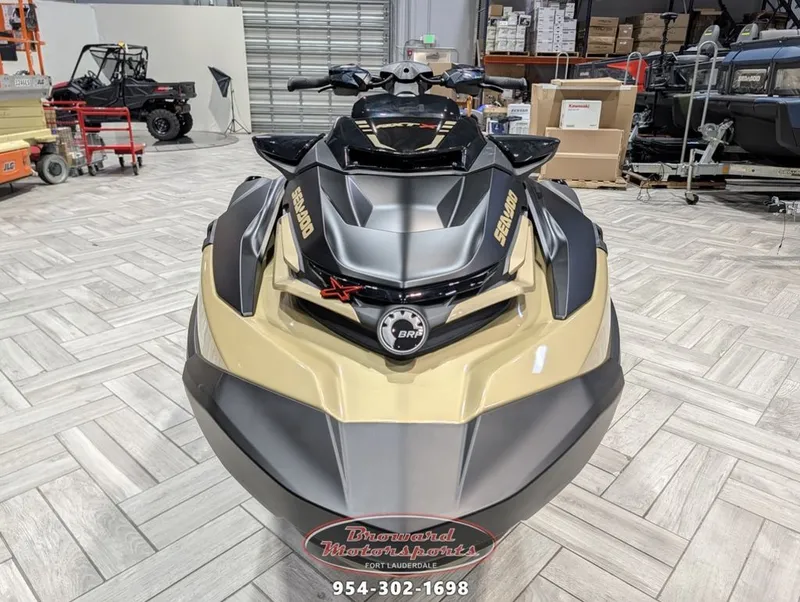 Slide: The Image of 2025 Sea-Doo RXT-X 325 jet ski in warehouse. - 2