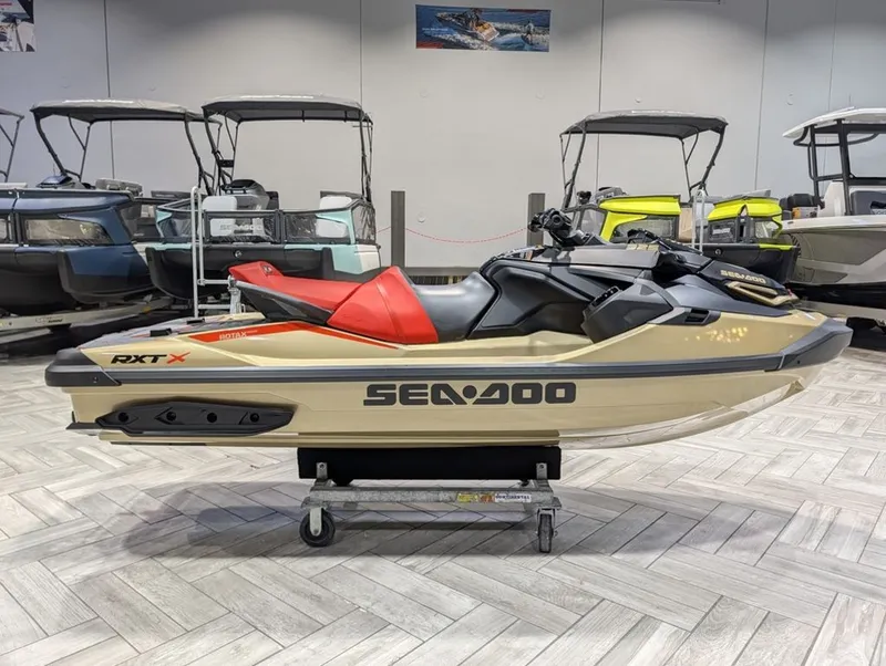 Slide: The Image of 2025 Sea-Doo RXT-X 325 Jet Ski in showroom. - 22