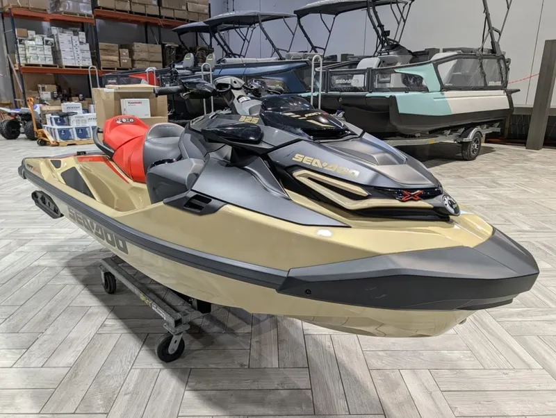 Slide: The Image of 2025 Sea-Doo RXT-X 325 jet ski in a warehouse. - 23