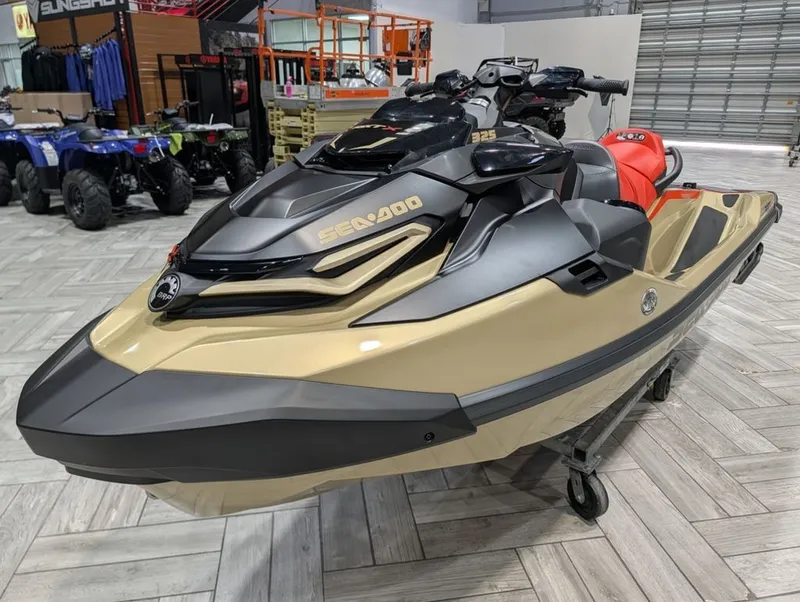 Slide: The Image of 2025 Sea-Doo RXT-X 325 jet ski in showroom. - 24