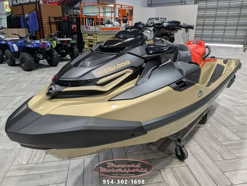 Slide: The Image of 2025 Sea-Doo RXT-X 325 jet ski in showroom. - 4