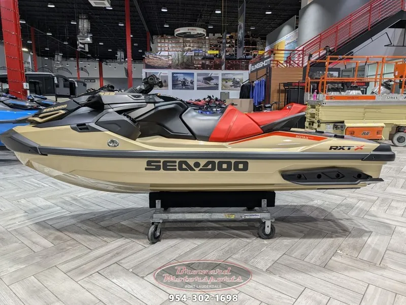 Slide: The Image of 2025 Sea-Doo RXT-X 325 jet ski displayed in showroom. - 5