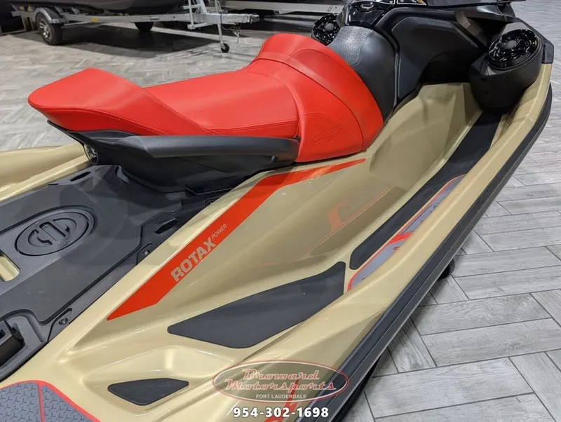 Slide: The Image of 2025 Sea-Doo RXT-X 325 jet ski with red seat and Rotax power. - 9