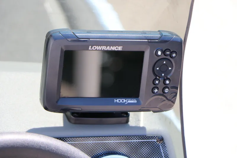 Slide: The Image of Lowrance Hook Reveal fish finder on 2014 Bass Tracker Pro 16 boat dashboard. - 28