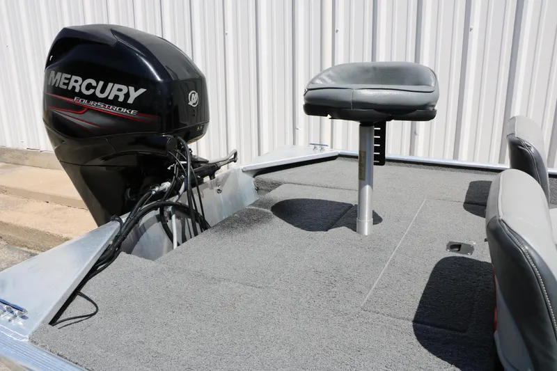 Slide: The Image of 2014 Bass Tracker Pro 16 boat with Mercury FourStroke engine and seating. - 29