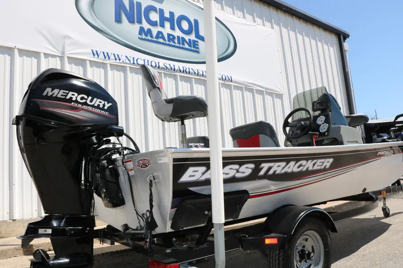 Slide: The Image of 2014 Bass Tracker Pro 16 boat with Mercury engine at Nichol Marine dealership. - 7