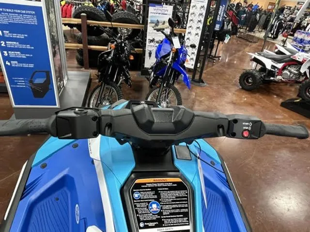 Slide: The Image of 2026 Yamaha WaveRunner JetBlaster in showroom, blue color, handlebar view. - 10