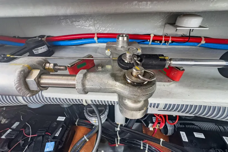 Slide: The Image of Mechanical components and wiring inside a 2020 Lagoon 42 catamaran. - 86