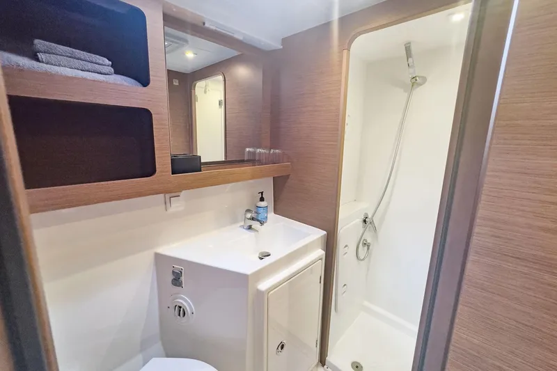 Slide: The Image of Modern bathroom in 2020 Lagoon 42 yacht with shower and sink. - 57