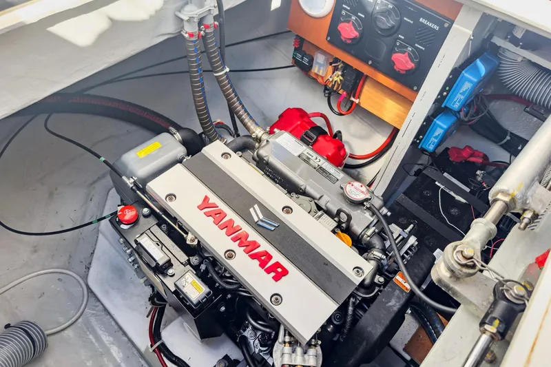 Slide: The Image of Engine compartment of a 2020 Lagoon 42 catamaran featuring a Yanmar engine. - 62