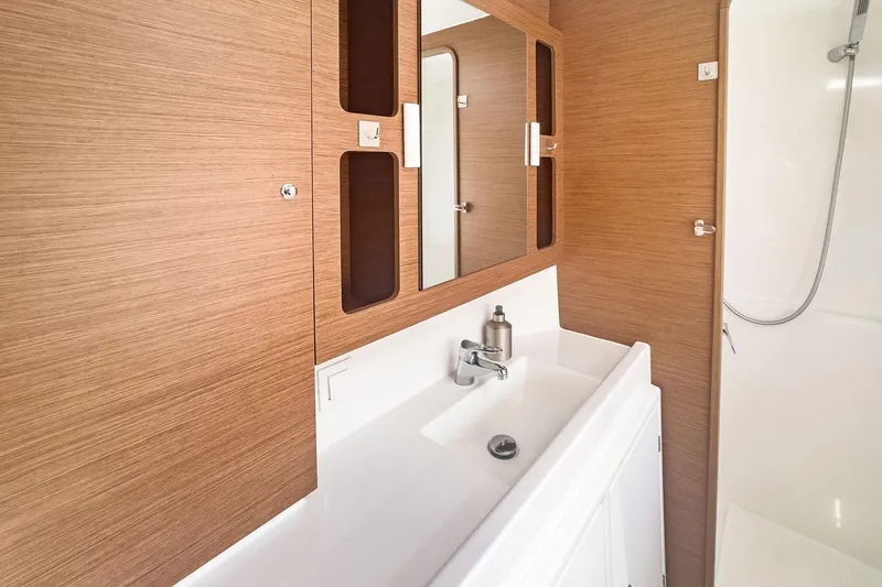 Slide: The Image of Modern bathroom interior of 2020 Lagoon 42 yacht with wooden accents and sleek fixtures. - 53