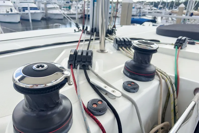Slide: The Image of Close-up of 2020 Lagoon 42 sailboat winches and ropes at marina. - 12