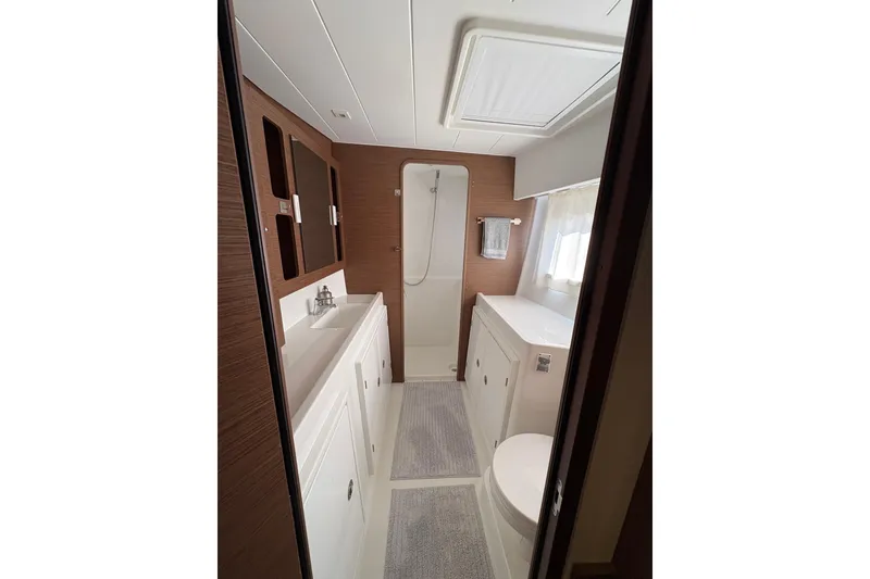 Slide: The Image of Modern bathroom interior of 2020 Lagoon 42 yacht, featuring sleek design and ample lighting. - 97