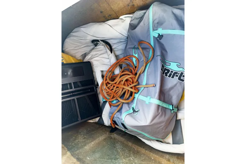 Slide: The Image of Storage compartment with sailing gear and rope on Lagoon 42, 2020 model. - 80