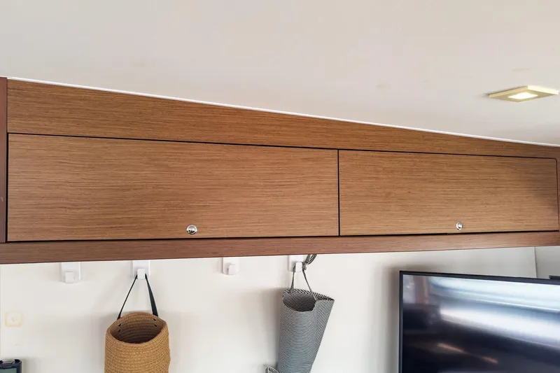 Slide: The Image of Wooden cabinet interior of 2020 Lagoon 42 yacht with modern design elements. - 41