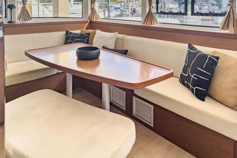 Slide: The Image of Interior of 2020 Lagoon 42 yacht with cozy seating and stylish cushions. - 37