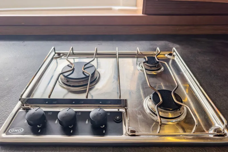Slide: The Image of Stainless steel stove with four burners on a 2020 Lagoon 42 yacht. - 26
