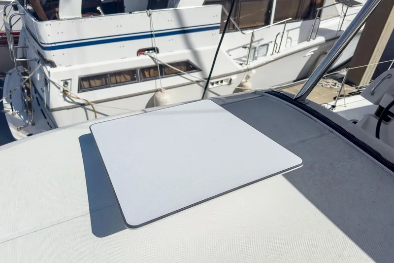 Slide: The Image of Rooftop of 2020 Lagoon 42 catamaran with a mounted satellite dish. - 22