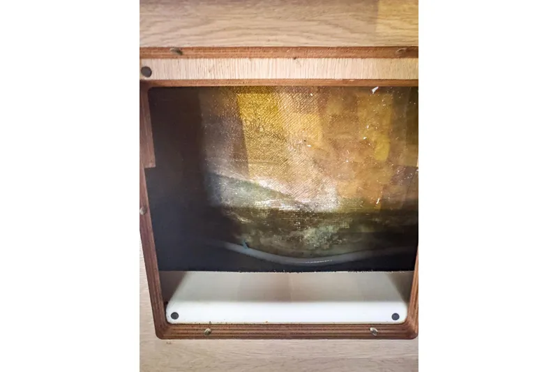 Slide: The Image of Interior view of a 2020 Lagoon 42 yacht, showcasing a wooden panel detail. - 75