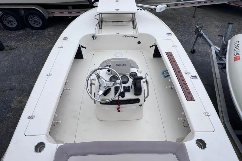 Slide: The Image of 2007 Scout 170 Costa boat interior with steering wheel and control panel. - 7