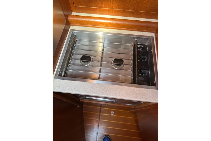 Slide: The Image of Stainless steel stove in 2002 Hunter 306 yacht kitchen. - 22