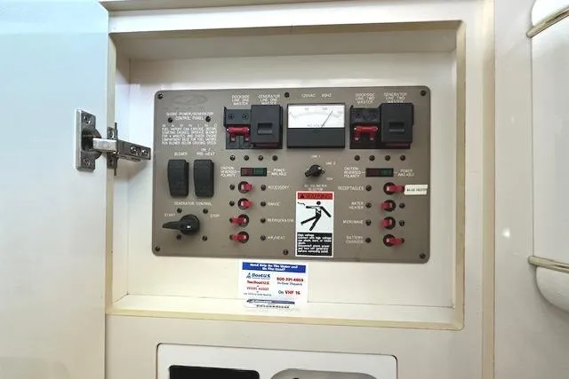 Slide: The Image of Electrical control panel on a 2001 Maxum 3000 SCR boat. - 27