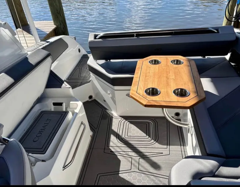 Slide: The Image of Interior of 2024 Cobalt R6SURF with wooden table and seating area. - 10