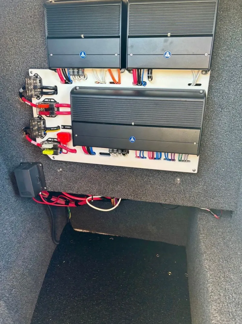 Slide: The Image of 2024 Cobalt R6SURF electrical system with amplifiers and wiring. - 14