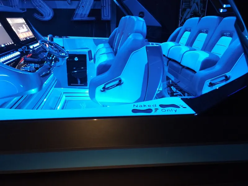 Slide: The Image of Interior of Renegade 42R 2027 with blue lighting. - 10