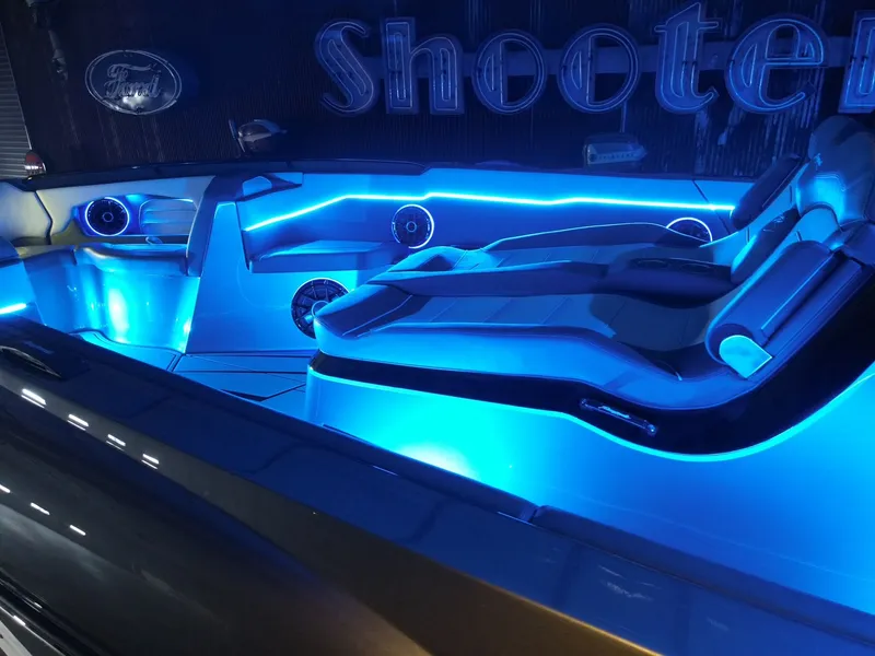 Slide: The Image of Renegade 42R 2027 with blue LED interior lighting. - 12