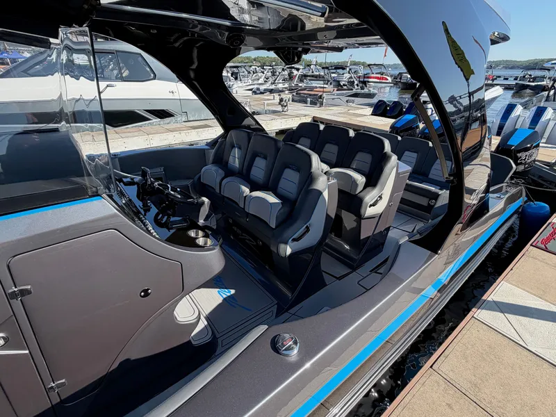 Slide: The Image of Interior of 2027 Renegade 42R with luxurious seating at the dock. - 3