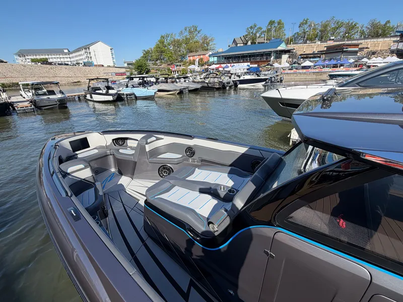 Slide: The Image of Renegade 42R 2027 boat docked, modern design. - 5