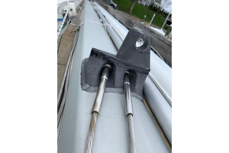 Slide: The Image of Close-up of rigging on a 1990 Bruce Roberts 35 sailboat mast. - 65