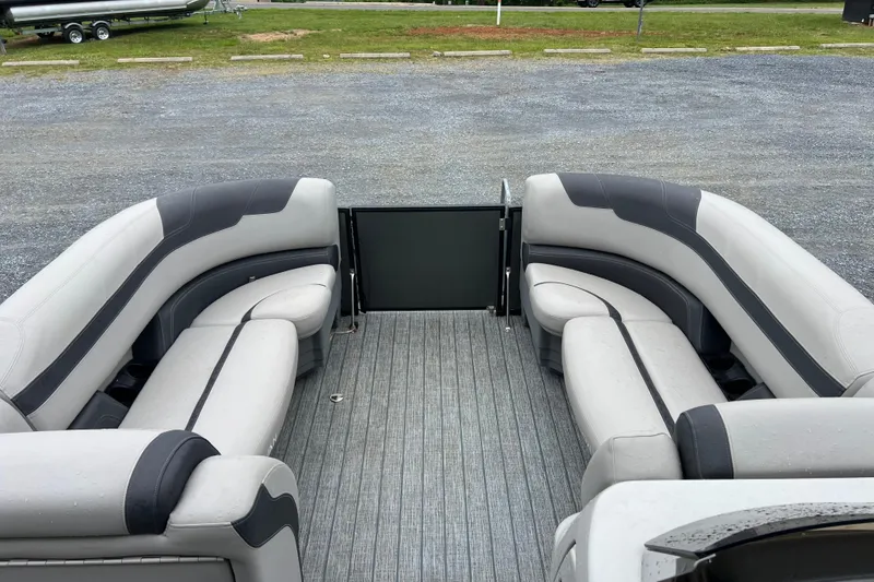 Slide: The Image of 2021 Sylvan L5 DLZ pontoon boat interior with gray seating and flooring. - 4