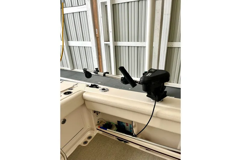 Slide: The Image of 2017 Grady-White Express 330 boat interior with mounted fishing equipment. - 6