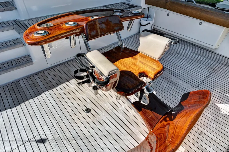 Slide: The Image of Luxurious teak fishing chair on 2008 Viking 74 Enclosed Bridge yacht deck. - 20