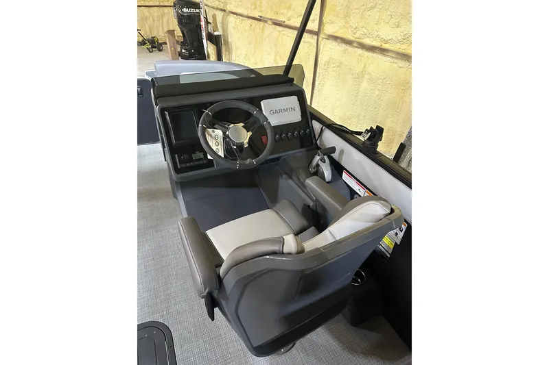 Slide: The Image of 2025 Manitou Cruise 22 Max Switchback helm with Garmin navigation system. - 5