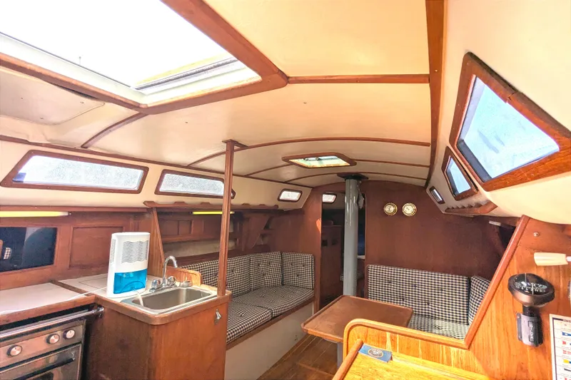 Slide: The Image of Interior of 1980 SCEPTRE 36 sailboat with wood finish and seating area. - 20