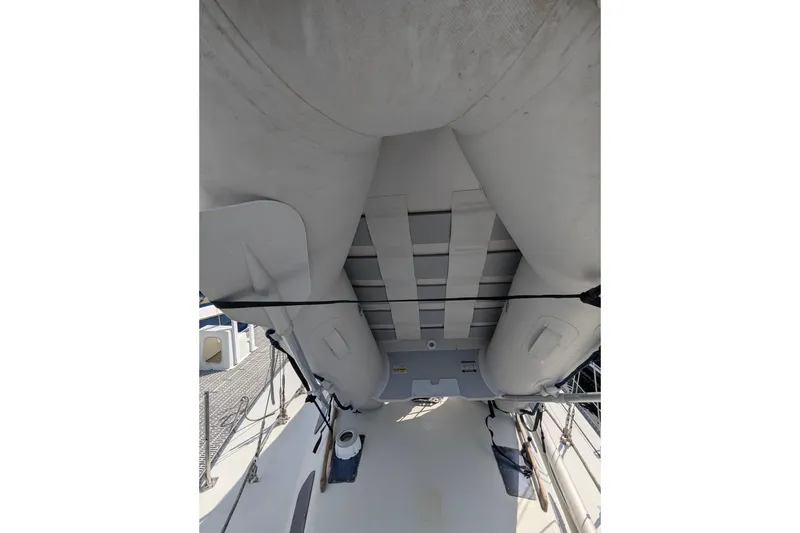 Slide: The Image of 1980 SCEPTRE 36 yacht deck with inflatable dinghy secured on top. - 30