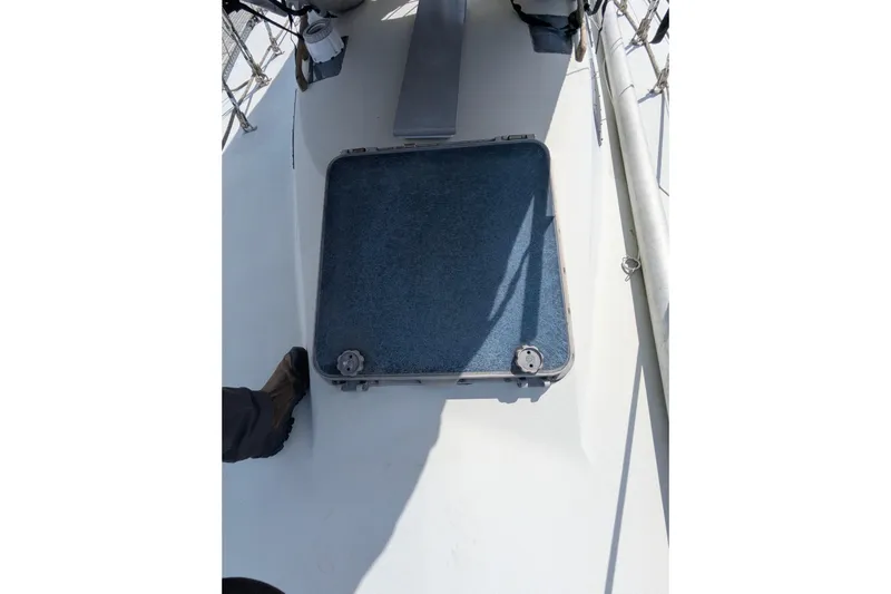 Slide: The Image of Deck of 1980 SCEPTRE 36 sailboat with open hatch and visible foot. - 32