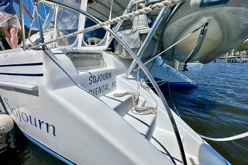 Slide: The Image of Sailboat "Sojourn" docked, featuring Manta 40 model, 1998, in Oriental, NC. - 102