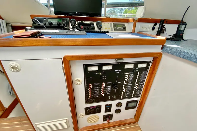 Slide: The Image of Control panel of a 1998 Manta 40 yacht with navigation and communication equipment. - 20