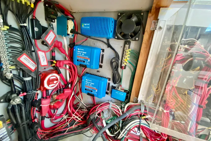 Slide: The Image of Electrical panel with wiring and components in a 1998 Manta 40 boat. - 24