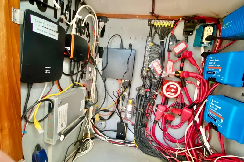 Slide: The Image of Electrical panel with wiring and devices in a 1998 Manta 40 boat. - 27