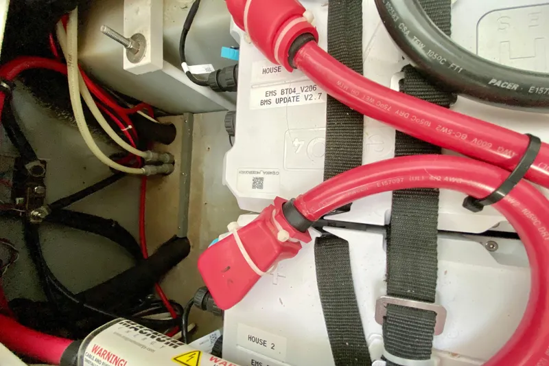 Slide: The Image of Electrical wiring and components inside a 1998 Manta 40 boat. - 41