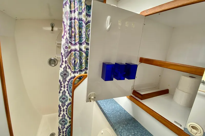 Slide: The Image of Bathroom interior of a 1998 Manta 40 yacht with shower and storage. - 57