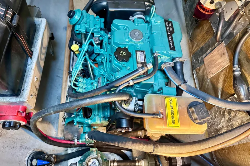 Slide: The Image of Engine compartment of a 1998 Manta 40 with Volvo Penta marine engine. - 77