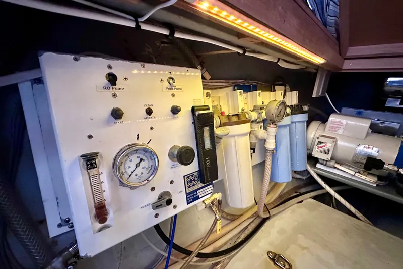 Slide: The Image of Control panel and filtration system inside a 1998 Manta 40 yacht. - 83