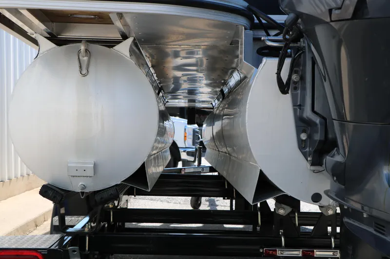 Slide: The Image of Underneath view of a 2020 Silver Wave 2210 SW5 L pontoon boat on a trailer. - 10